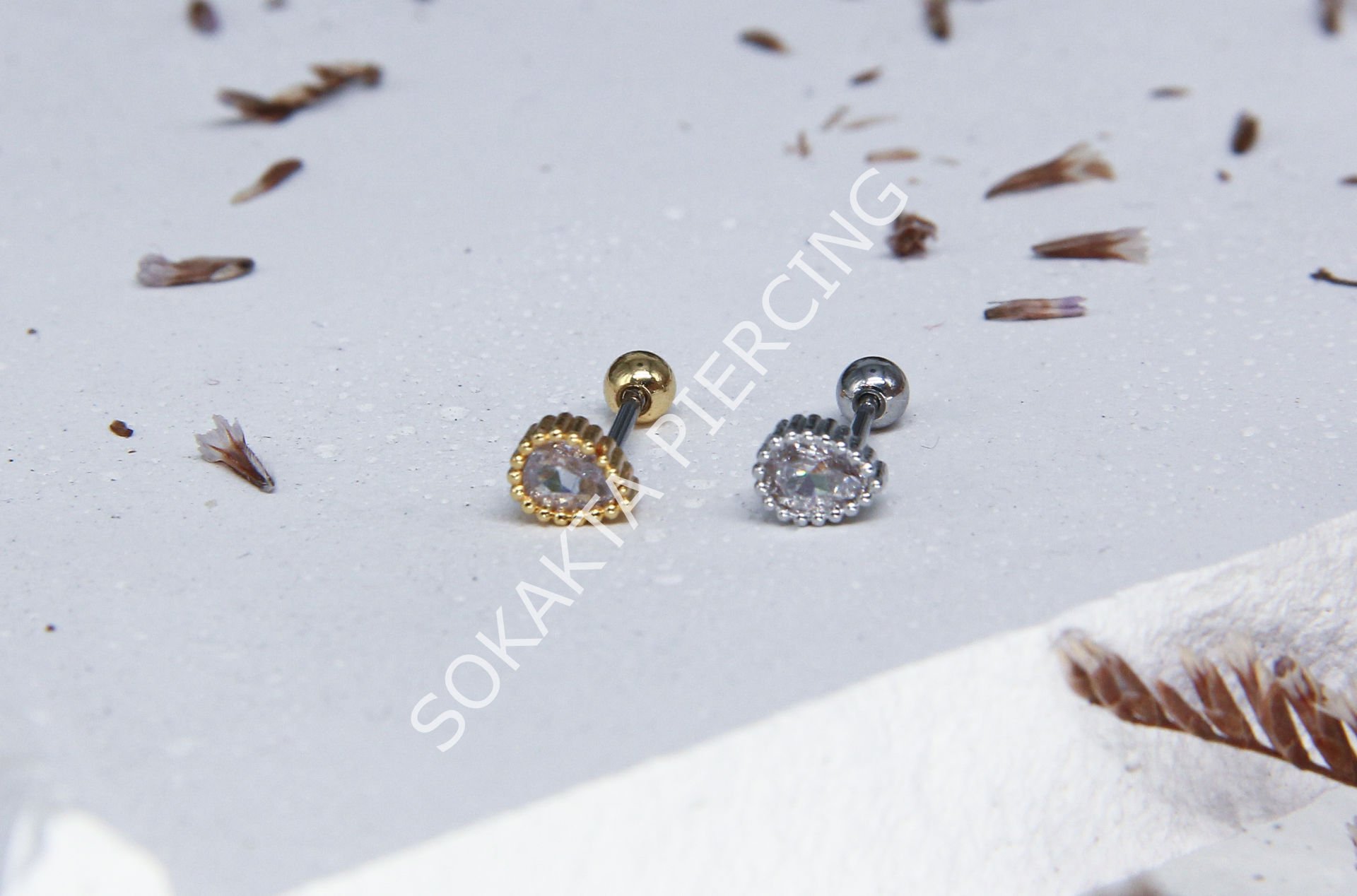 C28- TRAGUS Gold
