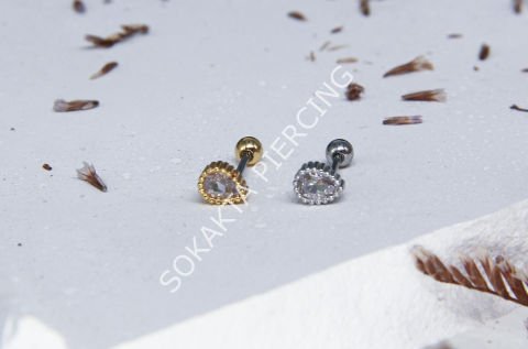 C28- TRAGUS Gold
