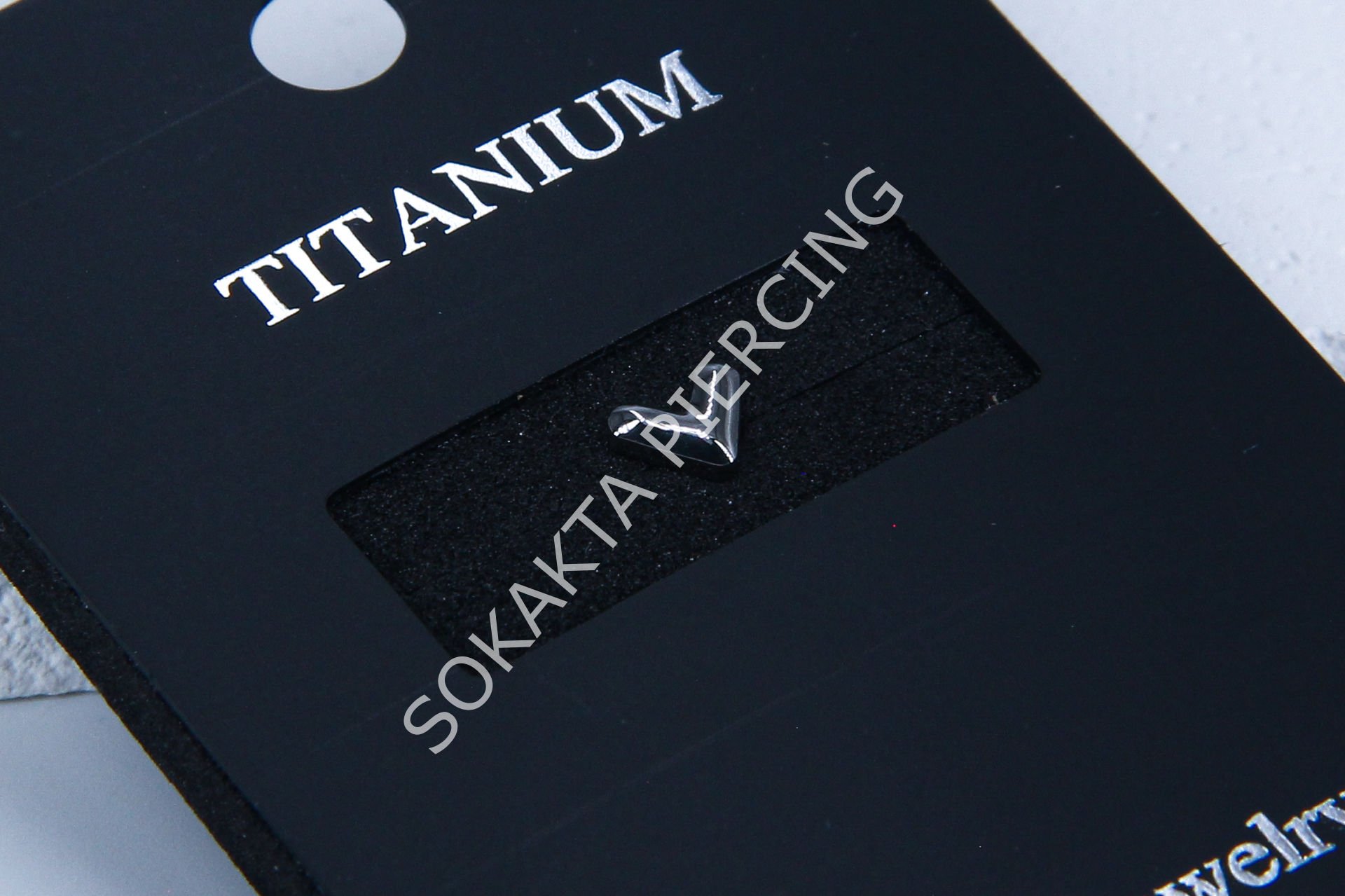 M28 - TITANIUM TRAGUS