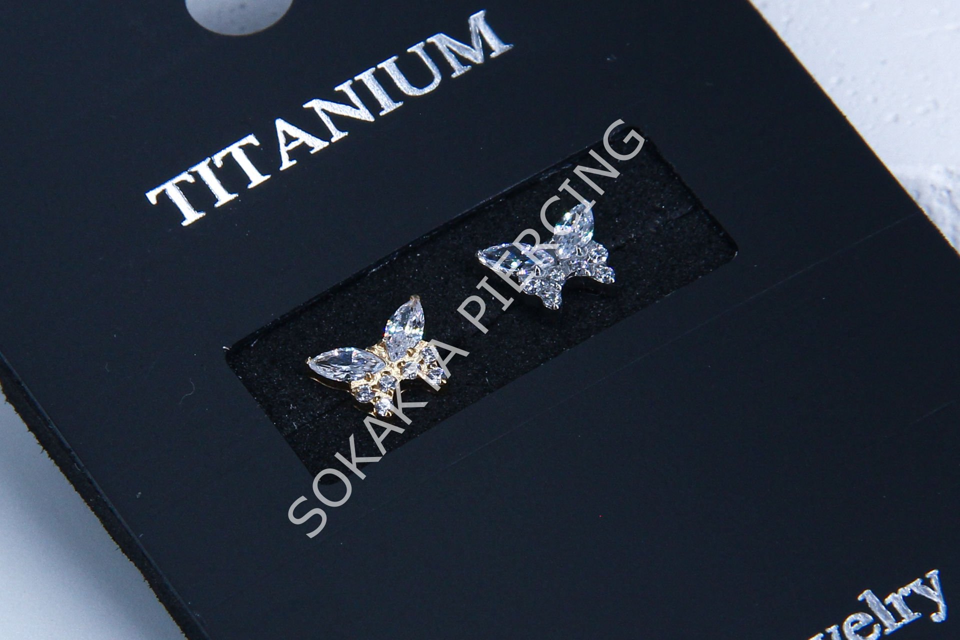 M56-57  - TITANIUM TRAGUS