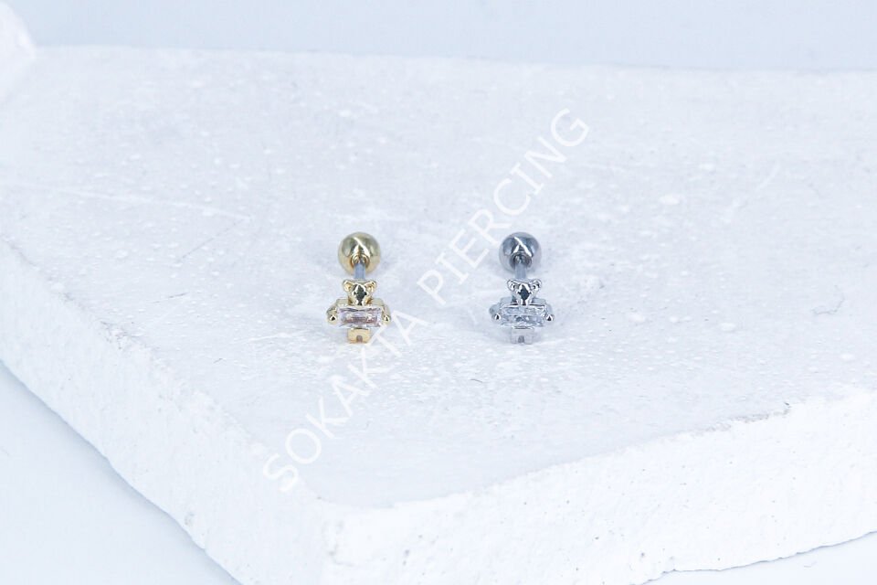 B23 - TRAGUS Gold