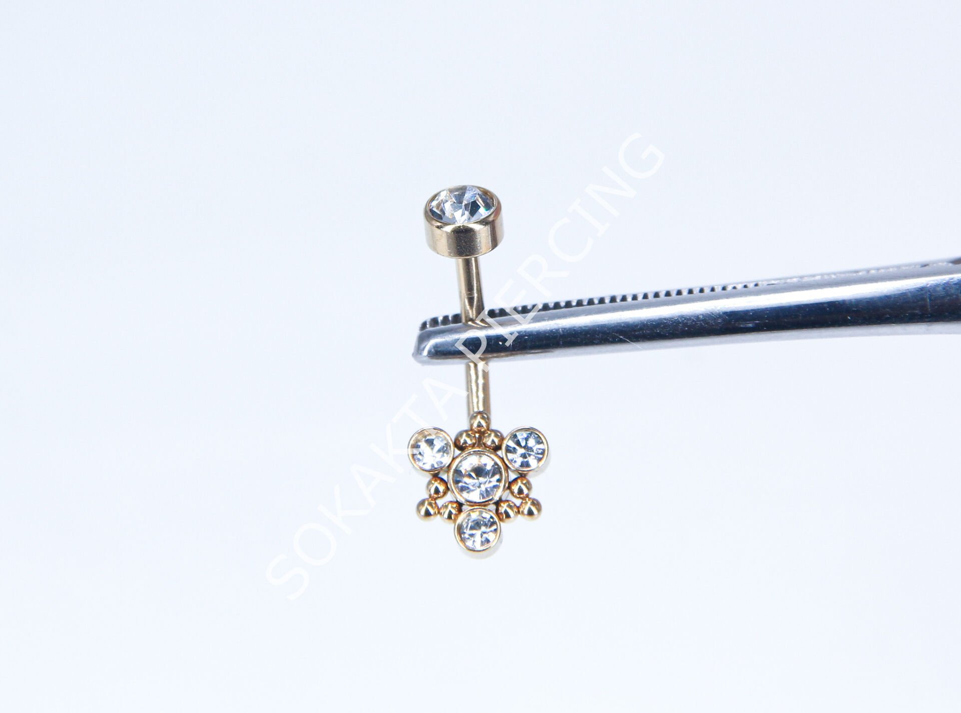 F55 - GÖBEK PİERCİNGİ