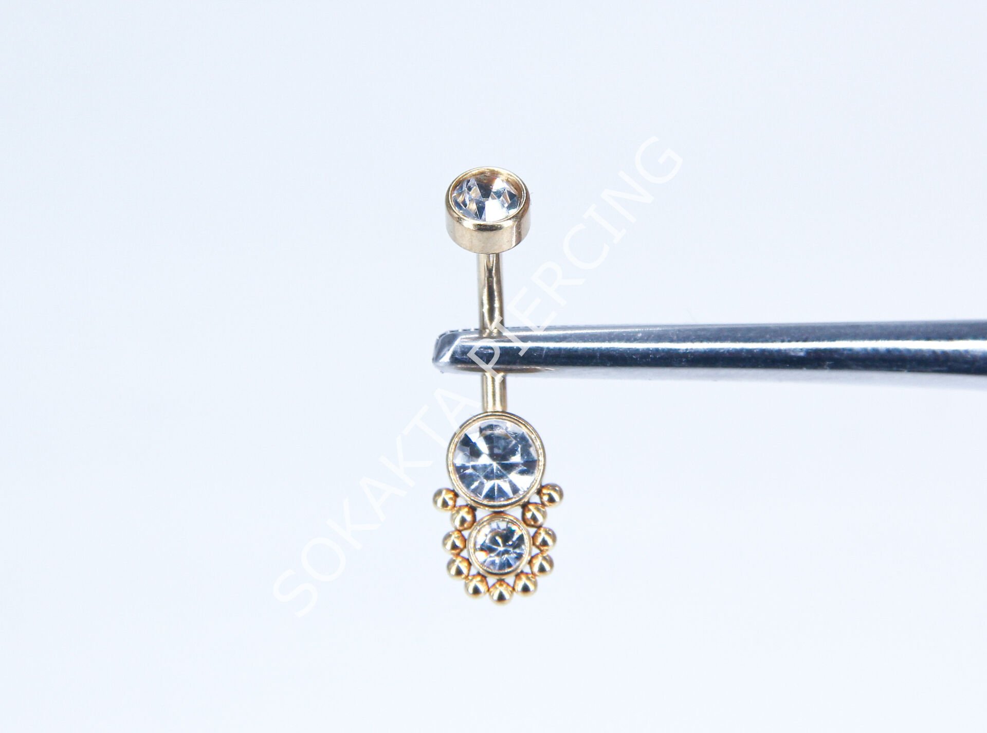 F52 - GÖBEK PİERCİNGİ