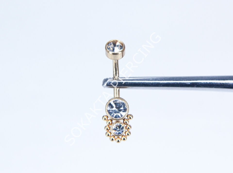 F52 - GÖBEK PİERCİNGİ